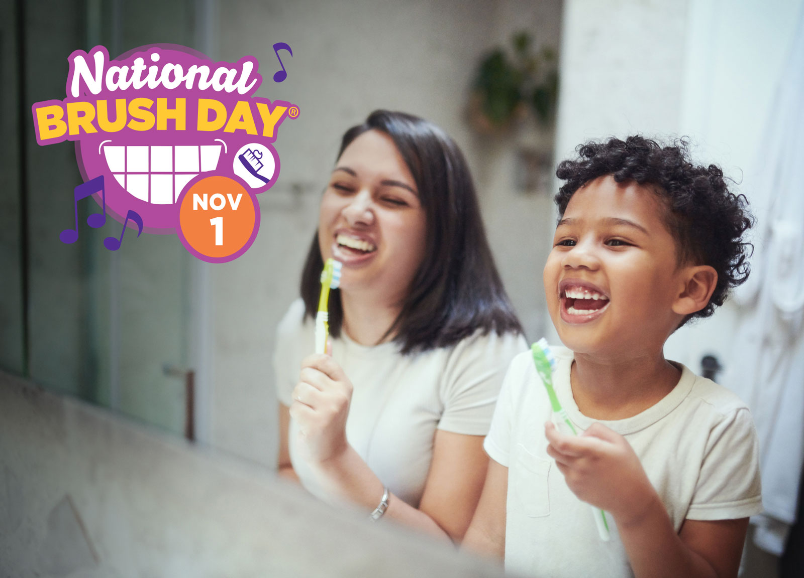 Mother and son singing into their toothbrushes with a National Brush Day logo